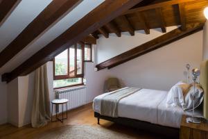 Posteľ alebo postele v izbe v ubytovaní Casa de lujo 15 mim de la playa Comillas entre mar y montaña