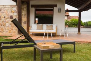 Vonkajšia záhrada v ubytovaní Casa de lujo 15 mim de la playa Comillas entre mar y montaña