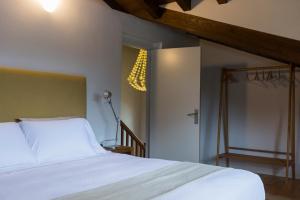Posteľ alebo postele v izbe v ubytovaní Casa de lujo 15 mim de la playa Comillas entre mar y montaña