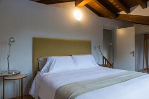 Posteľ alebo postele v izbe v ubytovaní Casa de lujo 15 mim de la playa Comillas entre mar y montaña