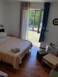 Postel nebo postele na pokoji v ubytování Sofial Guesthouse