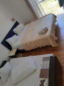 Postel nebo postele na pokoji v ubytování Sofial Guesthouse