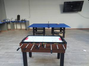 a ping pong table in a room with at Bm-9 room near the sea with air conditioning and WIFI in Cartagena de Indias +3 photos