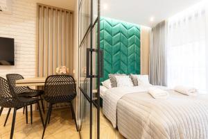 Posteľ alebo postele v izbe v ubytovaní Apartment Antalovka Residence & Spa