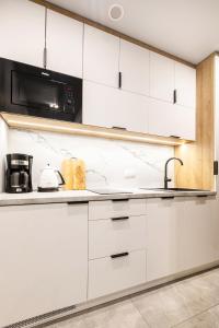 Kuchyňa alebo kuchynka v ubytovaní Apartment Antalovka Residence & Spa