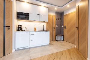 Kuchyňa alebo kuchynka v ubytovaní Apartment Antalovka Residence & Spa