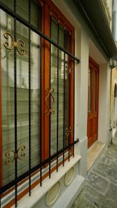 a front door of a house with a window at Diamond Apartment Piran FREE PARKING in Piran