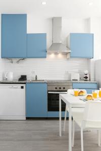 Køkken eller tekøkken på Rose Breeze Apartment + 14 billeder