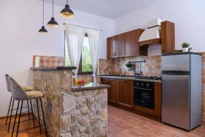 Kuchyň nebo kuchyňský kout v ubytování House Fran