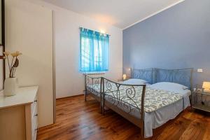 Postel nebo postele na pokoji v ubytování House Fran