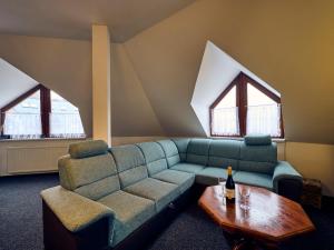 Posezení v ubytování Apartment Apartmán 611 by Interhome