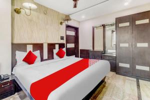 Katil atau katil-katil dalam bilik di OYO Flagship Hotel Vintage House