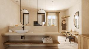 bagno con lavandino e 2 specchi di Princess Luxury Suites Adults Only - Princess Hotels Collection ad Agia Anna Naxos