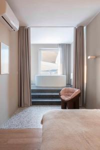 Letto o letti in una camera di Gozo Harbour Views, Mgarr Heights