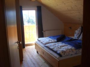 Postel nebo postele na pokoji v ubytování Bio-Bergbauernhof Möslhof