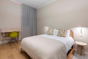Letto o letti in una camera di Gozo Harbour Views, Mgarr Heights