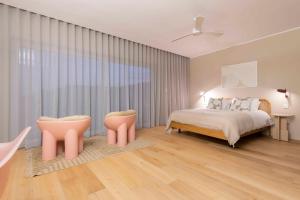 Letto o letti in una camera di Gozo Harbour Views, Mgarr Heights