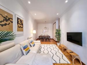 Televízia a/alebo spoločenská miestnosť v ubytovaní Magallanes - Iberorent Apartments