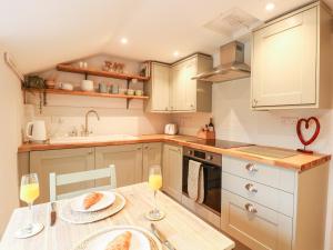 Køkken eller tekøkken på Holly Cottage