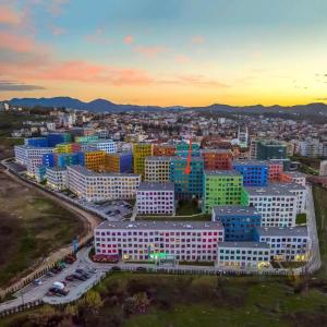 an aerial view of a large city with buildings at Modern apartment in Tirana in Tirana