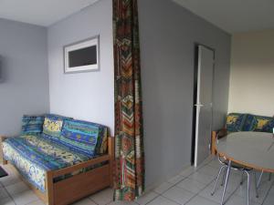 Posedenie v ubytovaní Appartement proche du Lydia