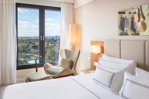 Postel nebo postele na pokoji v ubytování Melia Luxembourg