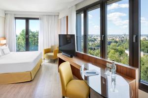 TV a/nebo společenská místnost v ubytování Melia Luxembourg
