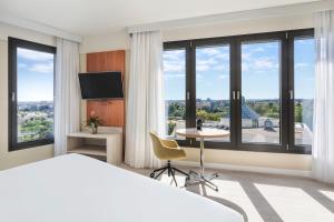 TV a/nebo společenská místnost v ubytování Melia Luxembourg