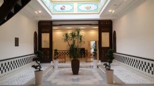 Vstupní hala nebo recepce v ubytování Heeren Palm Suites