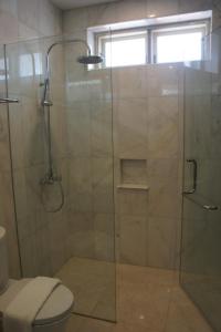 Koupelna v ubytování Heeren Palm Suites