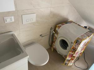 Koupelna v ubytování TOT apartment + 5 fotografií
