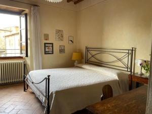 Postel nebo postele na pokoji v ubytování Locanda Antico Borgo