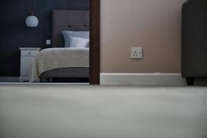 Postel nebo postele na pokoji v ubytování Villa Marni
