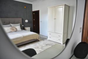 Postel nebo postele na pokoji v ubytování Villa Marni