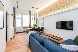 Posezení v ubytování Neues Design-Apartment in Friedrichshain
