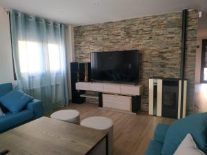 A television and/or entertainment centre at La Olma
