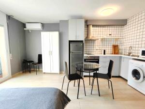 Kuchyňa alebo kuchynka v ubytovaní Mazi Apartments Suite