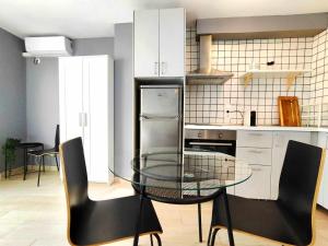 Kuchyňa alebo kuchynka v ubytovaní Mazi Apartments Suite