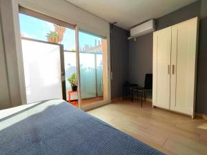 Posteľ alebo postele v izbe v ubytovaní Mazi Apartments Suite