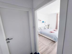 Posteľ alebo postele v izbe v ubytovaní Apartments Sv.Jakov