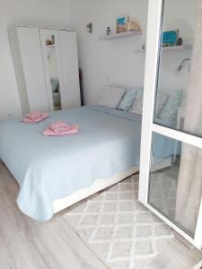 Posteľ alebo postele v izbe v ubytovaní Apartments Sv.Jakov