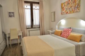 Posteľ alebo postele v izbe v ubytovaní B&B Rosa dei Venti