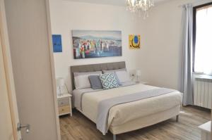 Posteľ alebo postele v izbe v ubytovaní B&B Rosa dei Venti