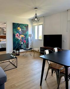 Televízia a/alebo spoločenská miestnosť v ubytovaní Bonito Apartamento Mar Azul