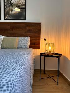 Posteľ alebo postele v izbe v ubytovaní Bonito Apartamento Mar Azul
