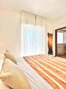 Un pat sau paturi într-o cameră la Residence Mareo