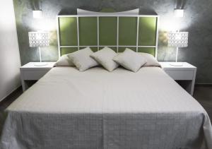 Posteľ alebo postele v izbe v ubytovaní B&B Ghalà