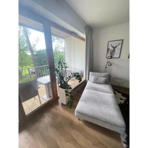 Postel nebo postele na pokoji v ubytování Lipno Port Apartment C101