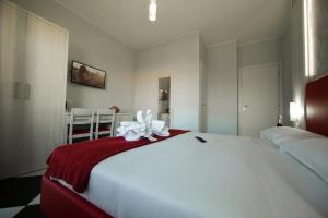 Postel nebo postele na pokoji v ubytování Love of Rome