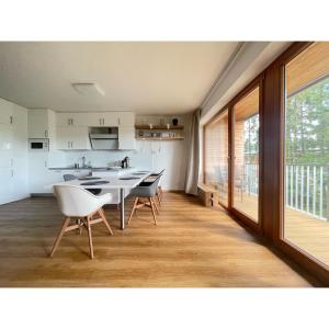 Kuchyň nebo kuchyňský kout v ubytování Lipno Port Apartment C101 + 12 fotografií